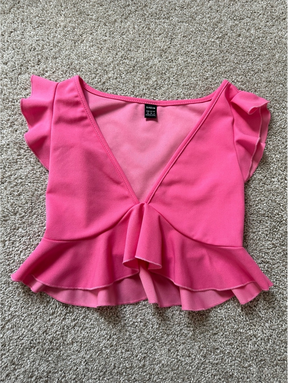 Pink ruffle peplum crop top